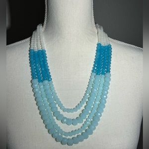 Multicolored four sting necklace